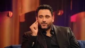 أكرم حسني.jpg