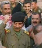 ملف:Saddam baghdad walk.jpg