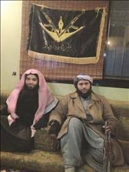 أبو عمر الشيشاني (يسار) مع المحيسني.