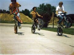 Children cycling during summer