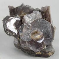 Lavender lepidolite "books" from Himalaya Mine, Mesa Grande District, San Diego County, California, US. Size: 4.8 x 3.9 x 3.5 cm