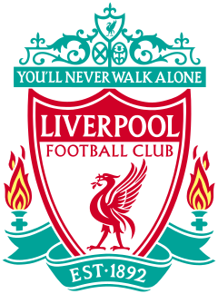 The words "Liverpool Football Club" are in the centre of a pennant, with flames either side. The words "You'll Never Walk Alone" adorn the top of the emblem in a green design, "EST 1892" is at the bottom