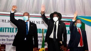 تصغيرالتوقيع على اتفاقية السلام بين الحكومة السودانية والحركات المسلحة. الواقفون على المنصة من اليسار: عبد الفتاح البرهان، سلڤا كير ميارديت، عبد الله حمدوك. جوبا، 31 أغسطس 2020.