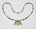 Pectoral and necklace of Princess Sithathoriunet; circa 1887–1813 BC; gold, carnelian, lapis lazuli, turquoise, garnet & feldspar; height of the pectoral: 4.5 cm (13⁄4 in.); The Met