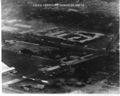 Aerial reconnaissance photos of the destroyed DAO Headquarters building with Air America Compound in the foreground