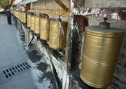 Prayer wheels at the base of the Potala in Lhasa, Tibet.