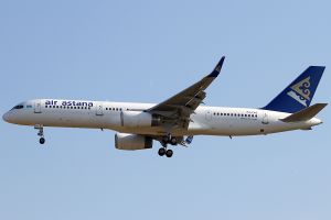 Side view of twin-jet aircraft in flight.