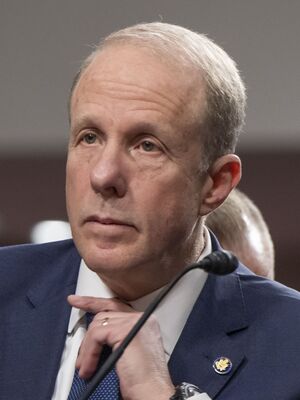 Headshot of Feinberg in a suit