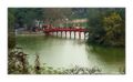 The Huc bridge and Hoan Kiem lake.