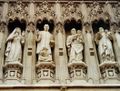 Four of the ten Christian martyrs depicted in statues above the Great West Door