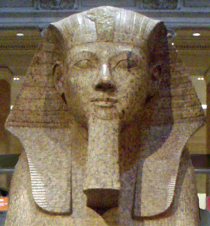 Large granite sphinx bearing the likeness of Hatshepsut, depicted with a false beard