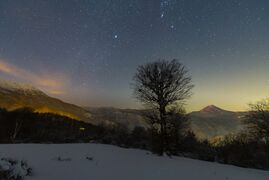Light pollution impact over Mt. Damavand from Hyrcanian forest.jpg