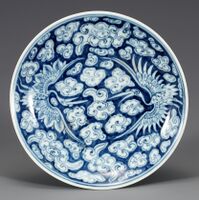 Porcelain dish with cloud and crane design