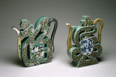 Pair of "Famille Verte" wine pots in the form of Fu (福) on the left and Shou (壽) on the right