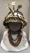 Sumerian necklaces and headgear discovered in the royal (and individual) graves of the Royal Cemetery at Ur, showing the way they may have been worn, in British Museum (London)