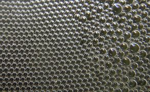 Hexagonal order of bubbles in a foam.