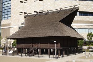 Brown building with an angular roof