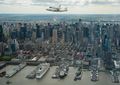 Enterprise over New York. The Intrepid Sea, Air & Space Museum, Enterprise's present home, can be seen below