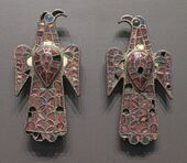 The Eagle-shaped fibulae of Alovera; 5th century; gold, bronze and glass (imitation of garnet); height: 11.8 cm, width: 5.9 cm; from Guadalajara (Spain); National Archaeological Museum (Madrid, Spain)