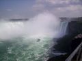 Maid of the Mist leisure boat in front of the falls
