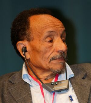 Rabhi, listening with earphones