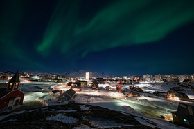 Nuuk, Greenland skyline at night under the northern lights (Quintin Soloviev).png