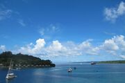 The natural harbour as viewed from town looking out at sea with Iririki Island to the left