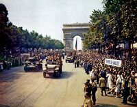 The Free French 2nd Armored Division marches down the Champs-Élysées on 26 August 1944 to celebrate the Liberation of Paris.