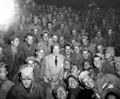 Bob Hope sits with men of U.S. X Corps, as members of his troupe entertain at Womsan, Korea. October 26, 1950. (U.S. Army)