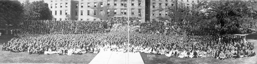 Students sit outside Pennsylvania State College, 1922ح. 1922