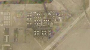 صورة أقمار صناعية تظهر تصاعد الدخان فوق مستودع وقود لشركة بترول أبوظبي الوطنية في منطقة المصفح.jpeg