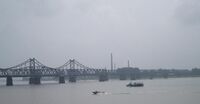 The Sino–Korean Friendship Bridge across the Yalu (Amnokgang) linking Sinuiju and Dandong.