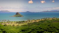 [[Mokoliʻi]] island, also known as Chinaman's Hat, offshore of Kualoa Valley