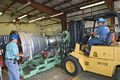 An Aerojet AJ26 rocket engine being delivered to the John C. Stennis Space Center.