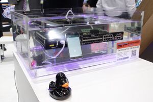 Network router and smart-phone immersed in synthetic single-phase, liquid immersion coolant