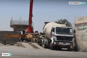 أحد أبراج المراقبة التي تبنيها قوات التحالف الدولي على نهر الفرات