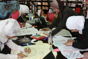 شعار ملتقى النساء التقنيات العرب 2010.