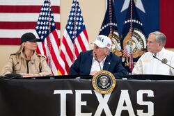 Melania Trump (left) with President Donald Trump and Texas Governor Greg Abbott on July 11, 2025