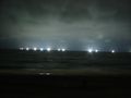 The lights from squid fishing boats, seen from Hakodate.
