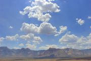 Cumulus mediocris clouds above Rainbow Ridge in Red Rock Canyon, Las Vegas, NV.