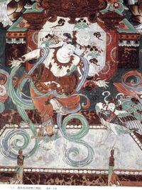 China, mid-Tang Dynasty. Artwork from the Dunhuang Grottos, Yulin Cave number 25 showing a Bird of Life, playing a pipa, with a dancer playing drum