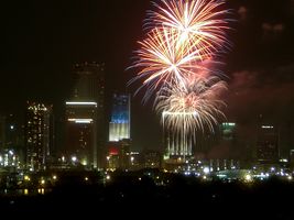 In addition to a fireworks show, Miami, Florida lights one of its tallest buildings with the patriotic red, white and blue color scheme on Independence Day