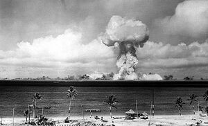 The airburst nuclear explosion of July 1, 1946. Photo taken from a tower on Bikini Island, 3.5 ميل (5.6 km) away.