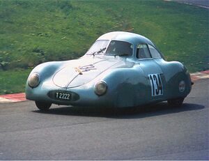 Blue sports racing car on the Nürburgring track in 1981.