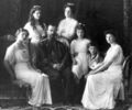 1911 photo by the Levitsky Company of the last Russian Royal Family. Clockwise from top: the Empress Alexandra Fyodorovna, the Grand Duchess Anastasia, the Tsarevich Alexei, the Grand Duchess Tatiana, Tsar Nicholas II, the Grand Duchess Olga, and the Grand Duchess Maria